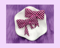 D. Pink and Black Bow Straw Topper