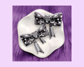 Raiders Bow Straw Topper