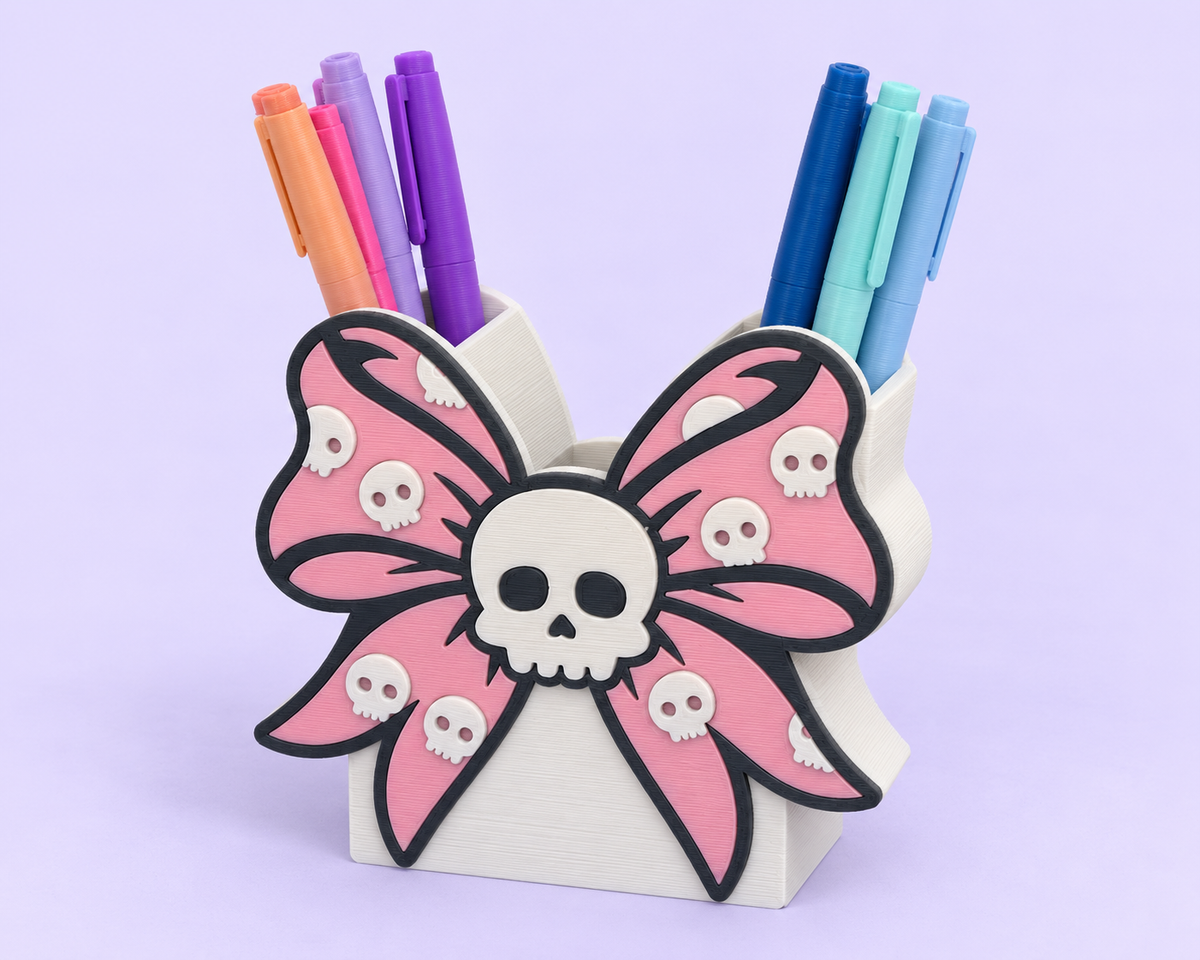Skull With Bow Pencil Holder